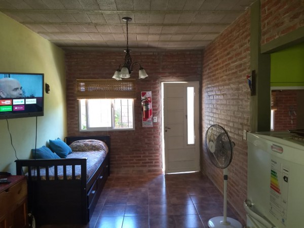 Complejo de cabañas y piscina en Santa Cruz del Lago
