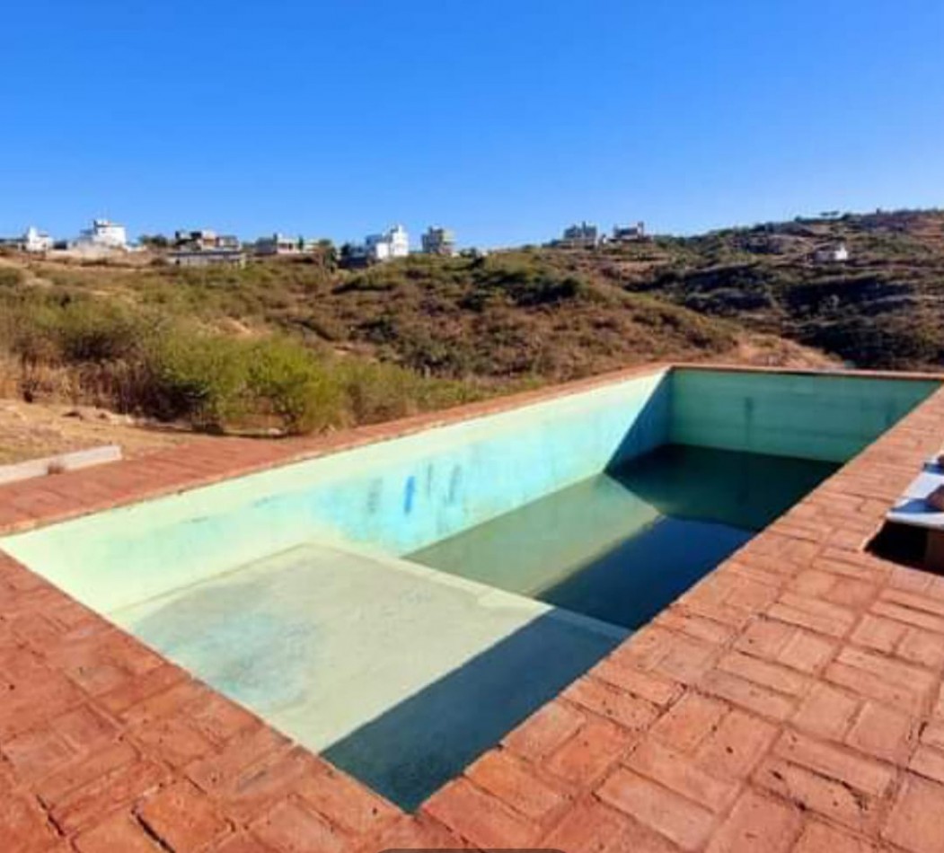 Casa de ensueño en Villa Parque San Miguel con vista al Lago San Roque